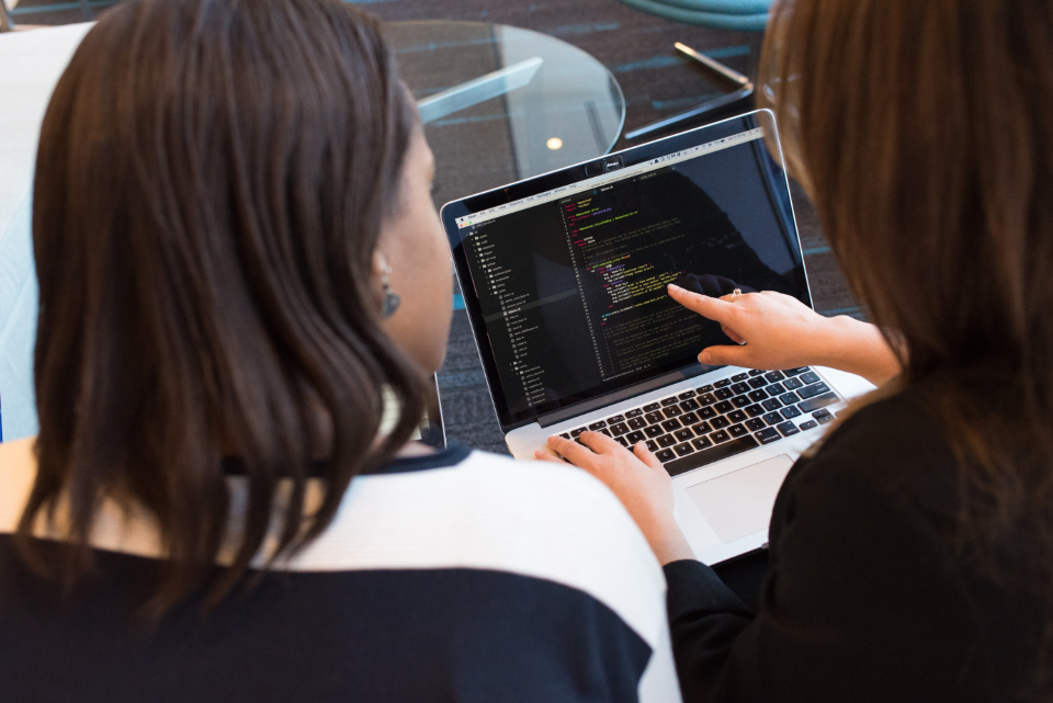 Developers reviewing code together